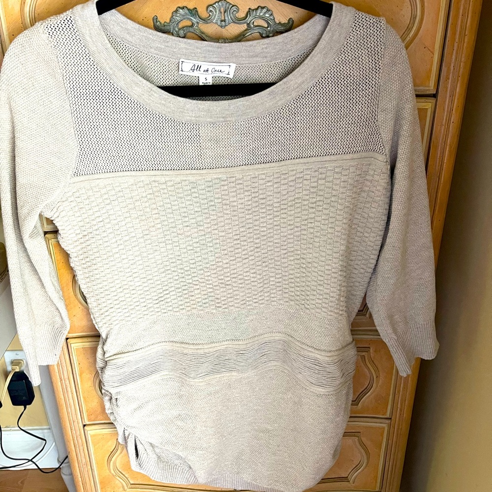Size small! Grey color. Never been worn!